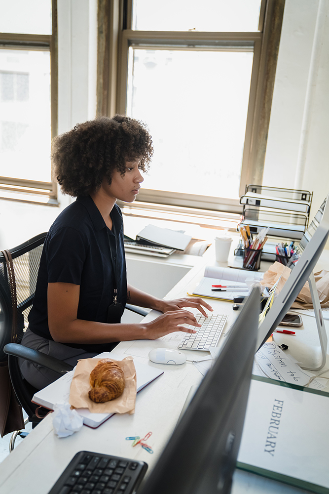 Professional editor working at a computer