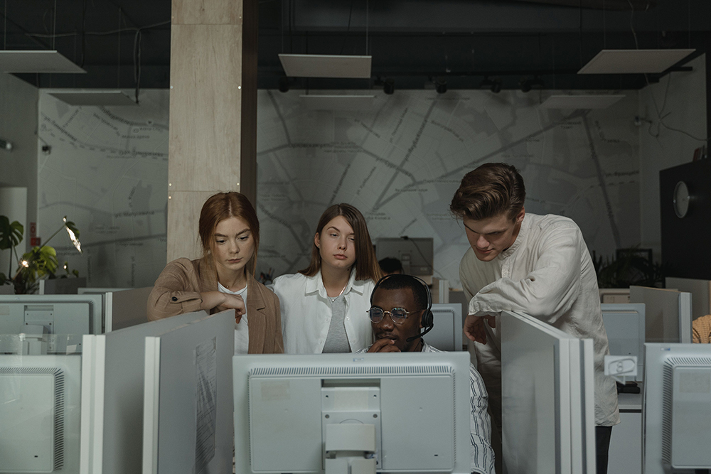 Team working at computer stations